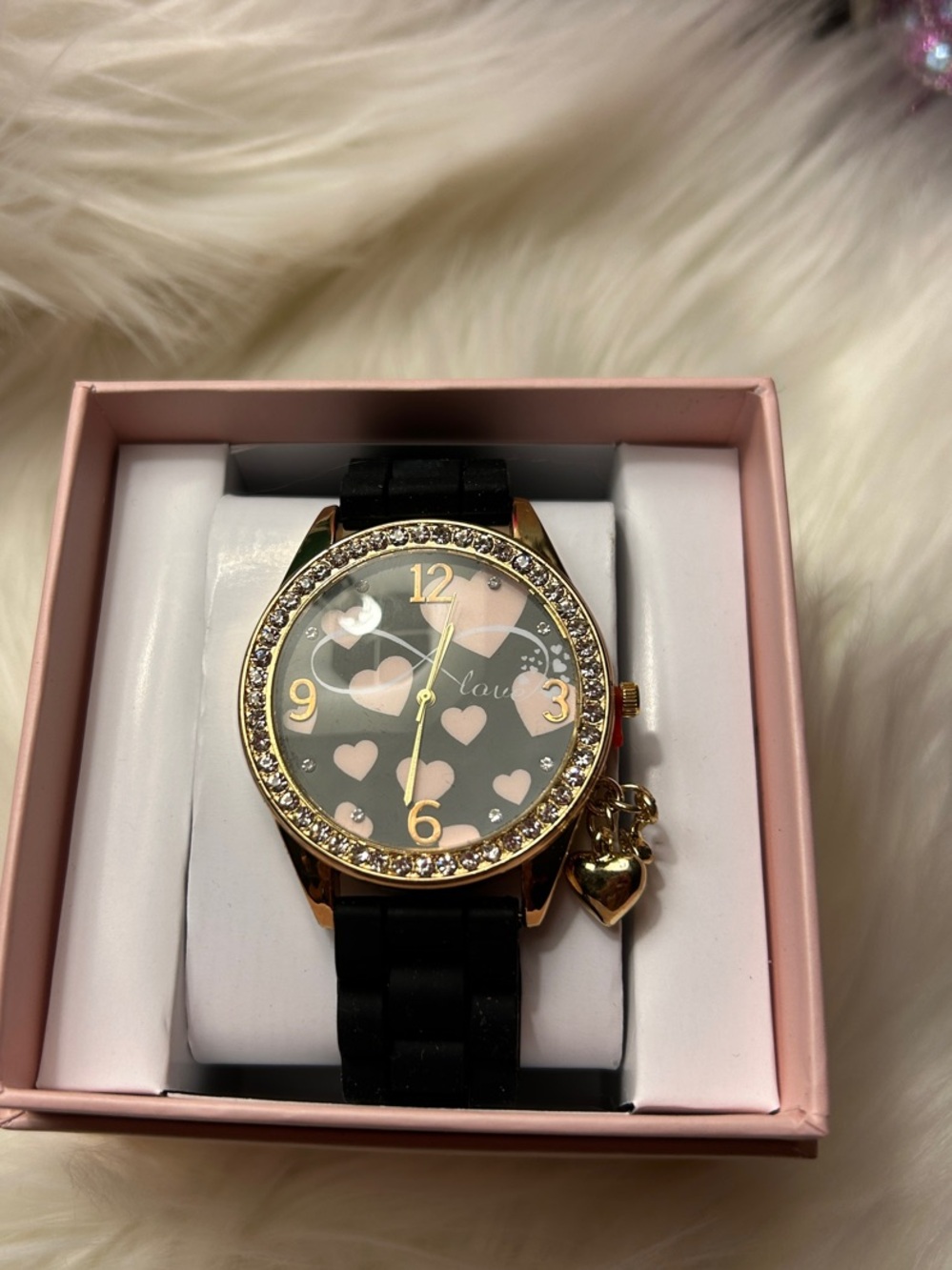 Kohl's Women's Black Strap Watch with Gold-Tone Case and Pink Heart Dial